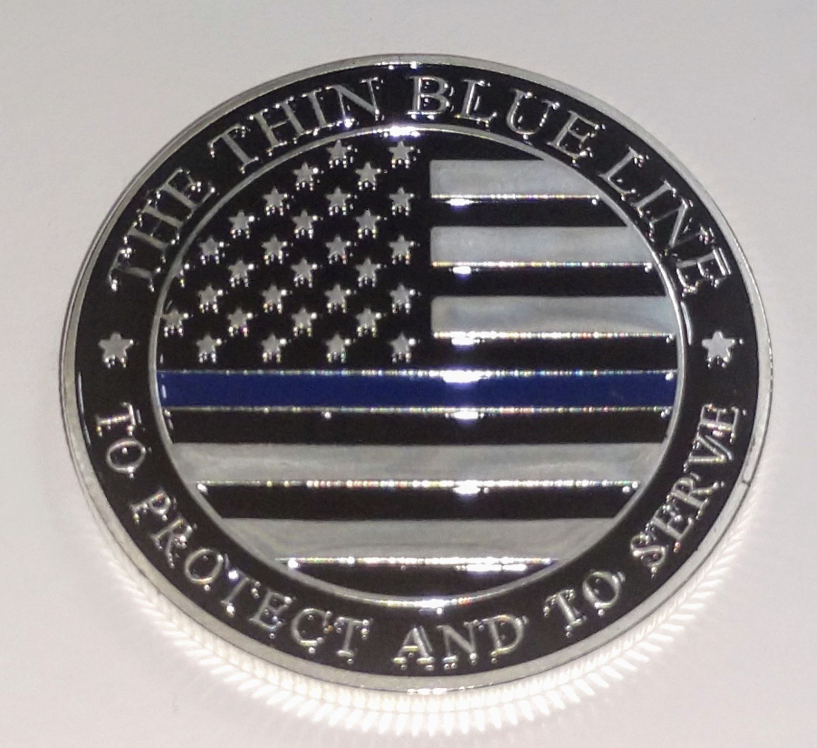 THIN BLUE LINE POLICE PROTECTION CHALLENGE COLORIZED ART ROUND gallery