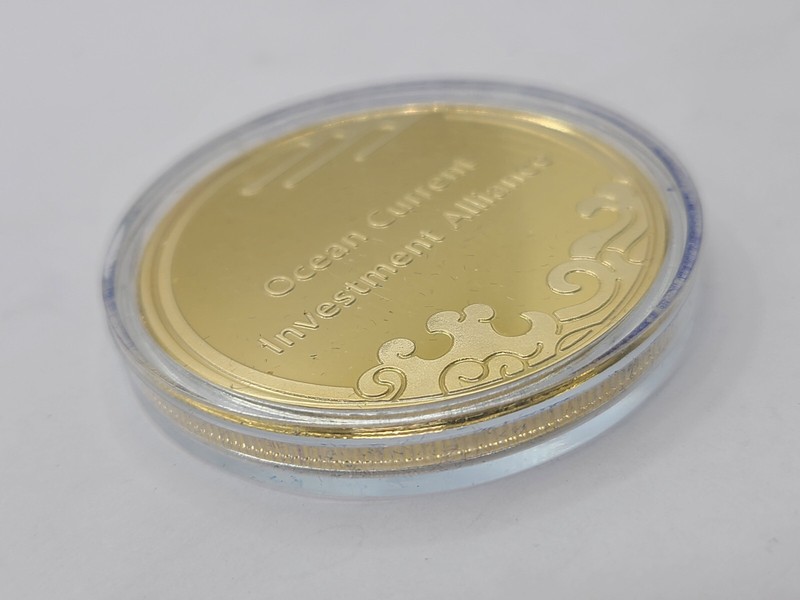 Ocean Current Investment Alliance 10th Anniversary Gold 2-inch Coin gallery