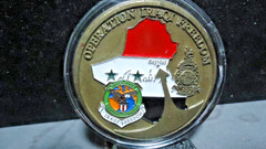 OPERATION IRAQI FREEDOM -BAGDAD – CHALLENGE COIN IN PLASTIC AIR TIGHT HOLDER