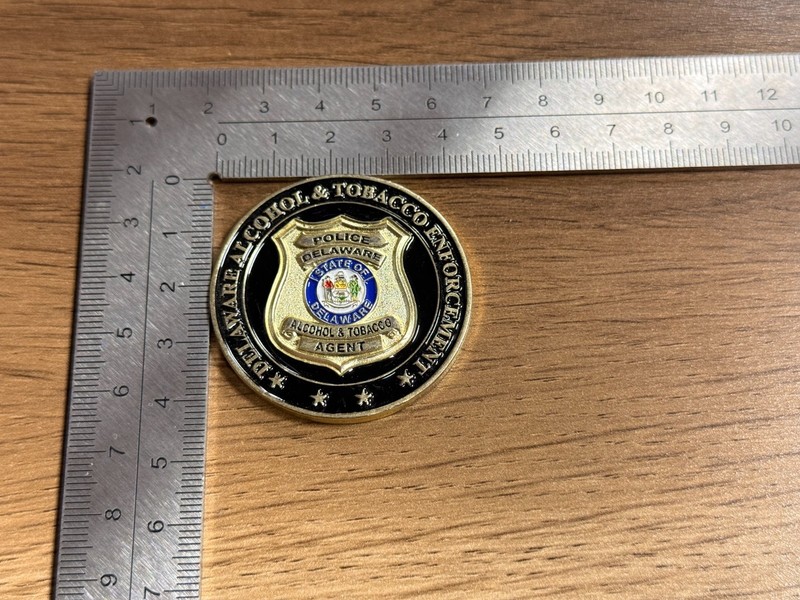 Delaware ATF Torch Run Special Olympics Challenge Coin 1#28 gallery
